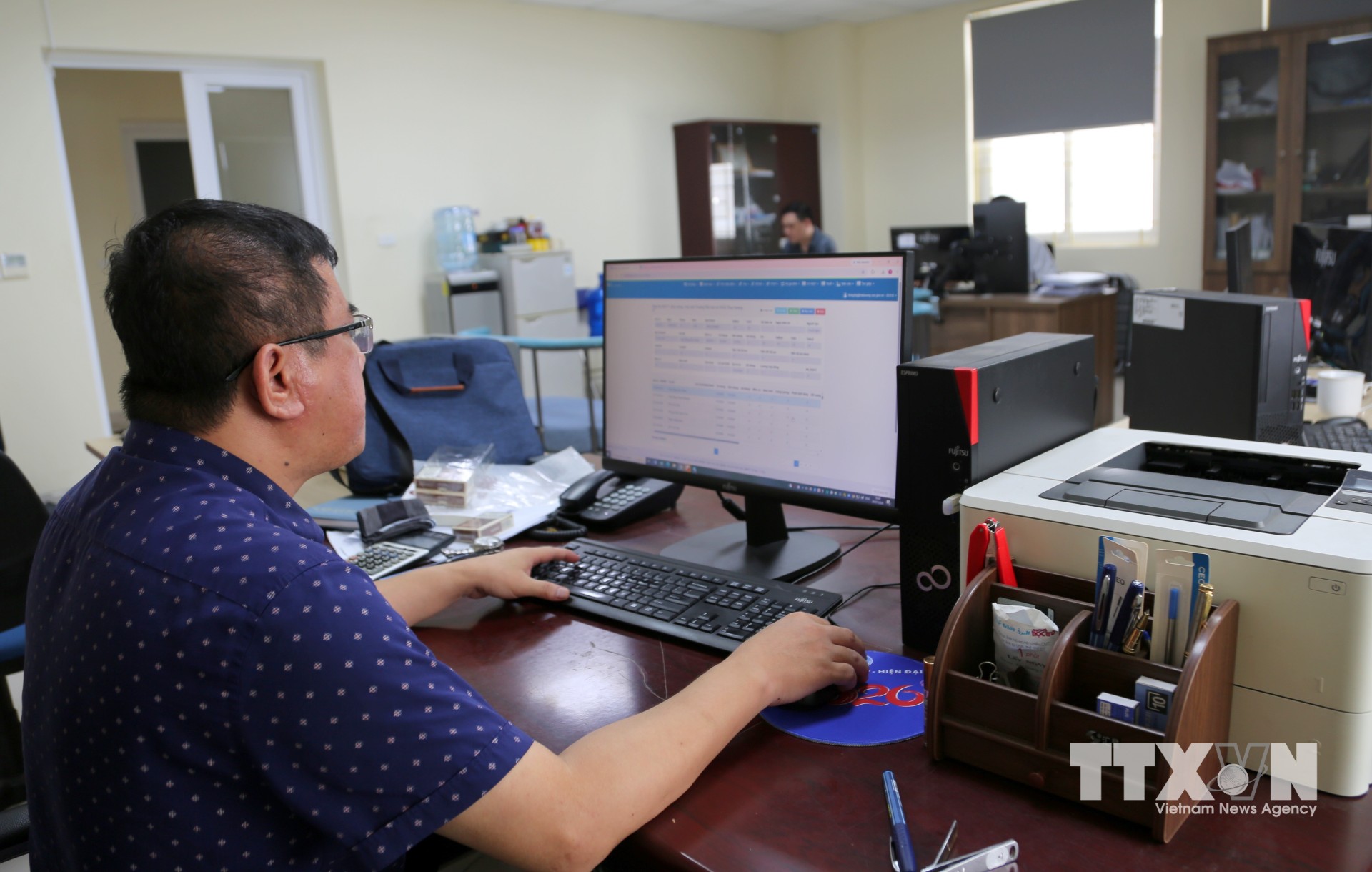 100% hoạt động chuyên môn của hệ thống bảo hiểm xã hội Hải Phòng triển khai trên môi trường số. (Ảnh: Minh Thu/TTXVN)